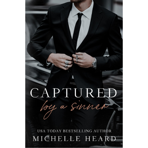 Captured By A Sinner by A Sinner by Michelle Heard (Author)