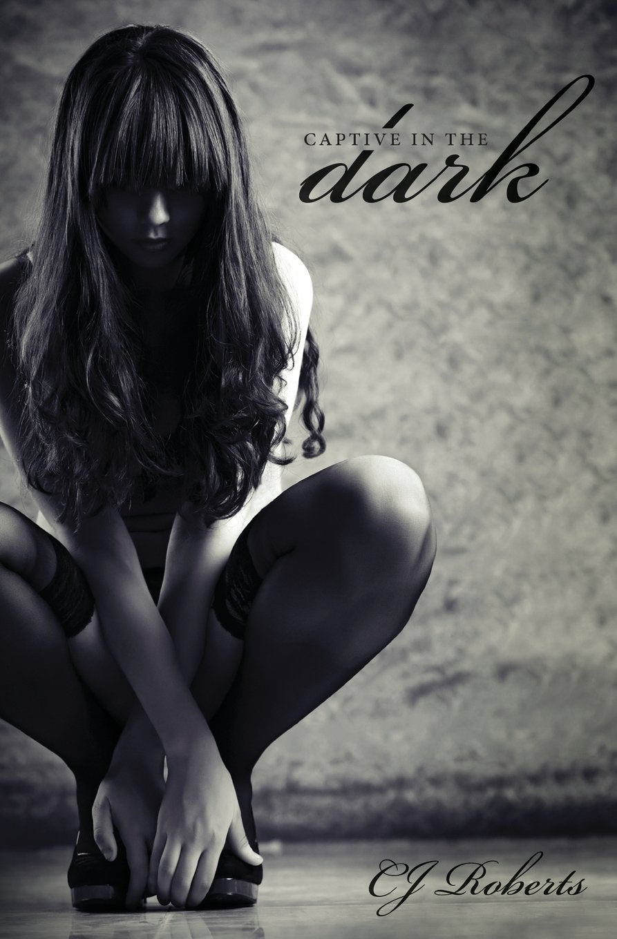 Captive in the Dark by CJ Roberts (Author)