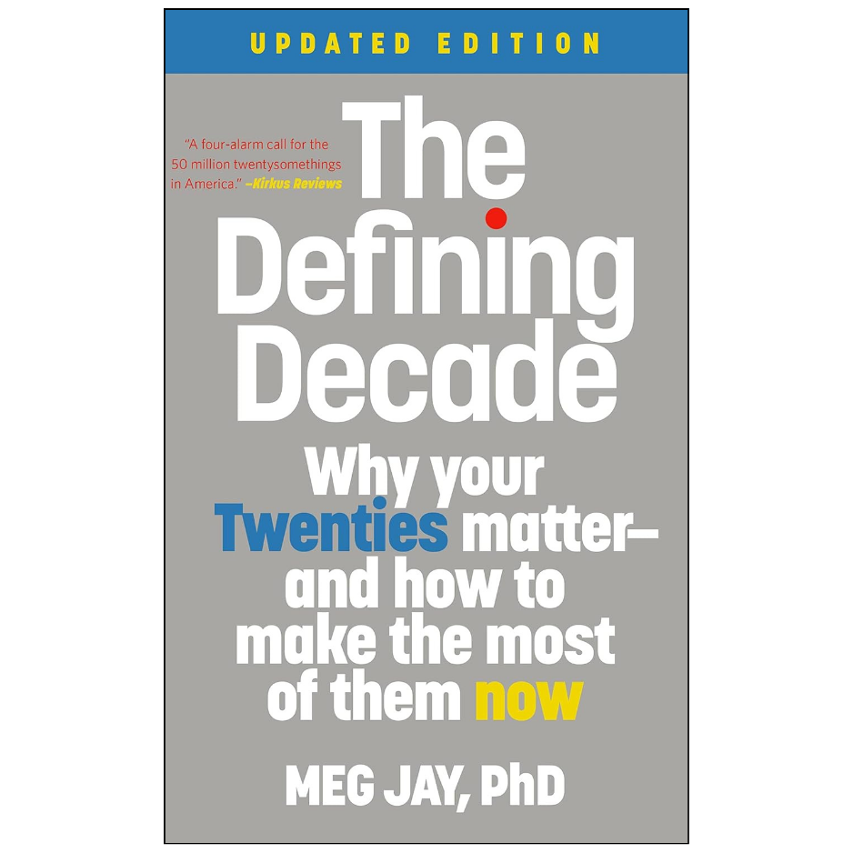 The Defining Decade: Updated Edition book cover by Meg Jay, PhD, featuring a gray background with white, blue, and yellow text.