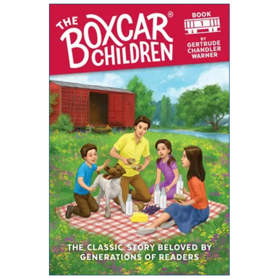 Front cover of the children's book 'The Boxcar Children' by Gertrude Chandler Warner, showing an illustrated family picnic scene with a dog in a grassy field beside a red barn.