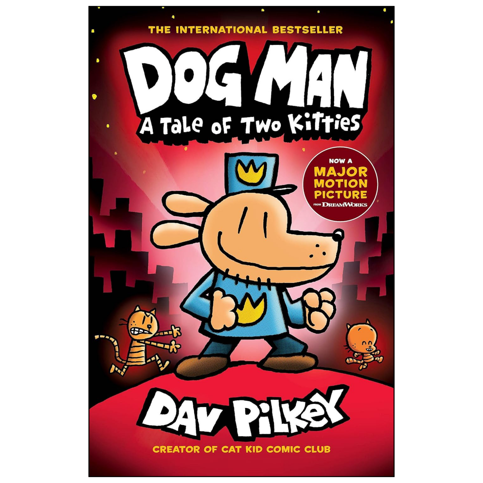 Front cover of the children's book 'Dog Man: A Tale of Two Kitties' by Dav Pilkey, featuring a cartoon dog in a blue police hat and uniform on a red and black city background.