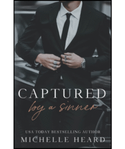 Captured By A Sinner by Michelle Heard (Author)